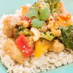 This one-pot spicy honey cashew chicken quickly coats chicken pieces in a gluten-free coating and then drizzles a spicy honey, sesame, garlic, sriracha sauce overtop the golden chicken and tender vegetables for an amazing asian-inspired dish!