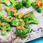 Roasted sriracha cream broccoli is an easy and quick combination of fresh broccoli florets drizzled in a sriracha lime cream sauce and then roasted until fragrant and tender in the oven. This spicy and creamy veggie side will kick your meal times up about 100 notches. www.ahotsouthernmess.com