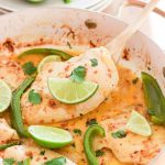 This gluten-free creamy cilantro lime chicken recipe combines the fresh flavors of cilantro, lime, and coconut, with the juiciness of baked chicken and veggies, perfect for warm weather! Your taste buds will think they were on a tropical island!