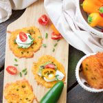 Taco cheese crisps are an easy and quick baked party recipe! These crispy cheese dippers are the perfect appetizer or snack for any gluten-free or low carb munchers and are huge hits at tailgating parties! All you need is cheddar cheese, taco seasoning, your favorite taco toppings, and a few minutes of oven time! Yes!