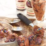 Skinny double chocolate ice cream + berry swirl recipe takes homemade no-churn ice cream up a notch. Dark chocolate flavors are mixed with bananas and almond milk and drizzled with a berry swirl before freezing into a creamy sweet treat!