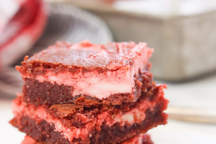 Moist and delicious gluten free red velvet cheesecake bars are quick and easy to make, are extremely creamy and decadent, and are perfect when you are in the mood for a little indulgence! There is still plenty of time to whip these up before Valentine's Day y'all!