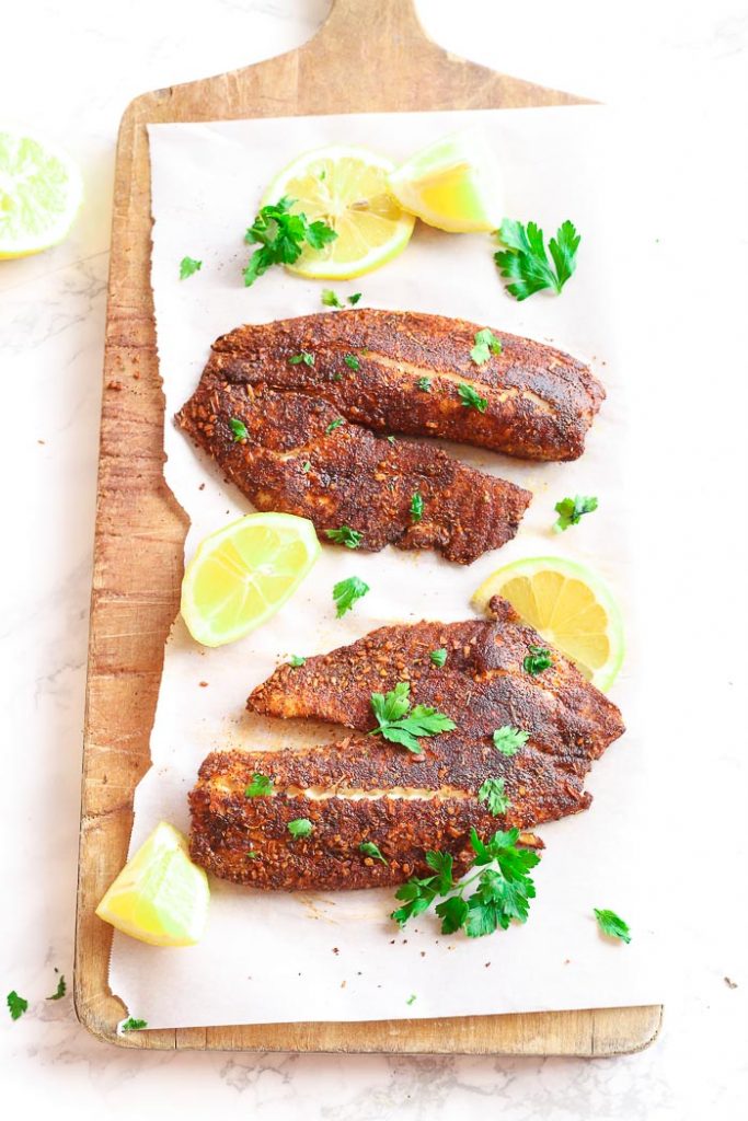 blackened fish on cutting board