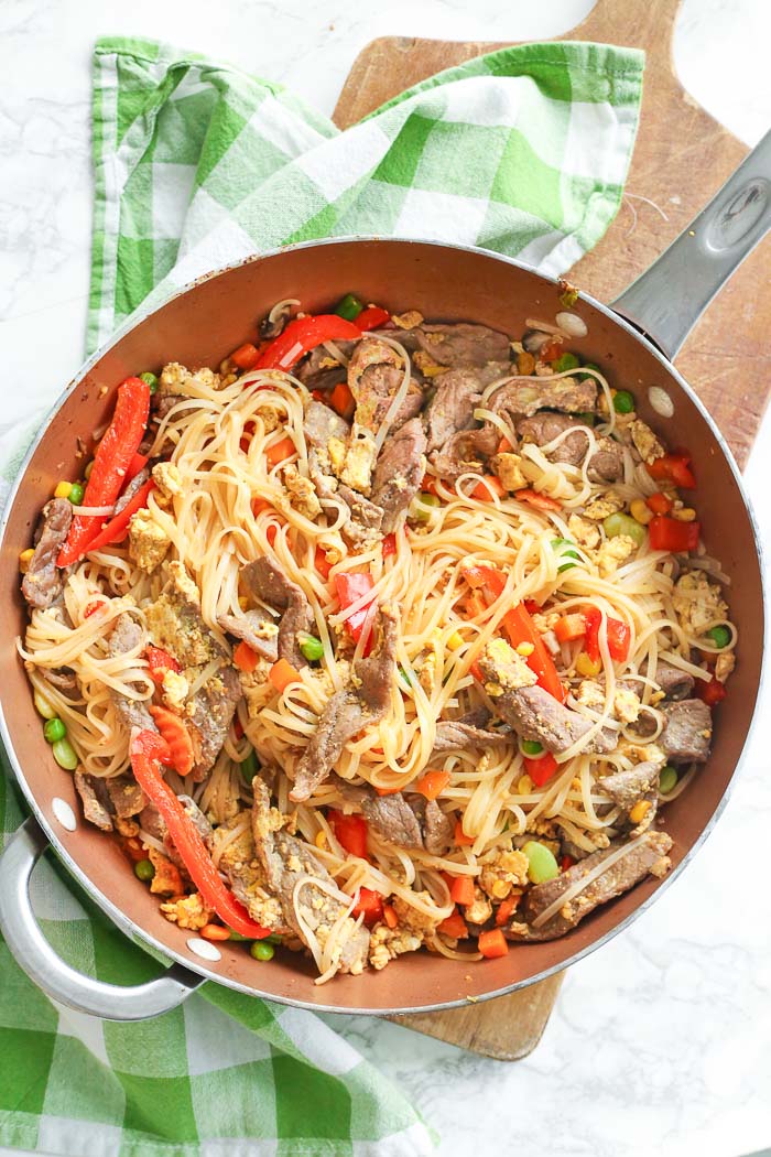 beef pad thai in white bowl