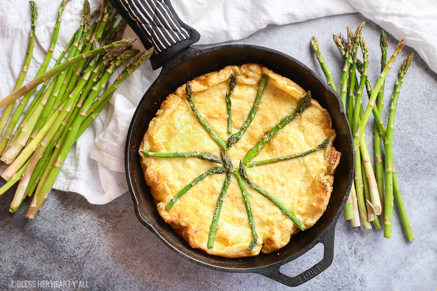 gluten free swiss asparagus dutch baby is the most moist, smooth, cheesy dutch baby and so easy to make! Just bake for 12-15 minutes!