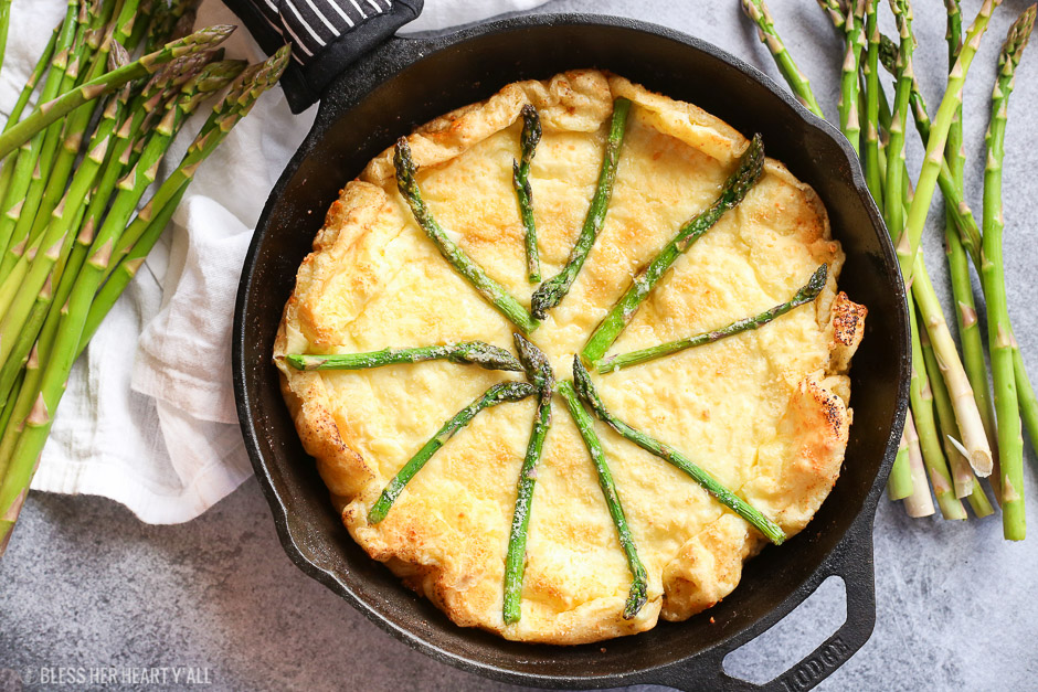gluten free swiss asparagus dutch baby is the most moist, smooth, doughy and cheesy dutch baby and so easy to make! Just bake for 12-15 minutes!