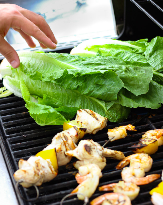 This Grilled Shrimp + Chicken Caesar Salad is so easy and tasty for a healthy summer meal! This recipe can be found at www.ahotsouthernmess.com