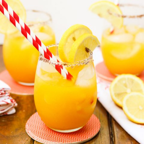 A sweet refreshing twist on summer lemonade. The fusion of mango and chili powder along with a splash of hot sauce, add a fun spicy summer twist {oh, and did I forget to mention the chili powder and sugar-laced rims? How dare me???}. And for those of us 21 or older, the addition of white rum makes this sipping cocktail a fruity delight! www.ahotsouthernmess.com