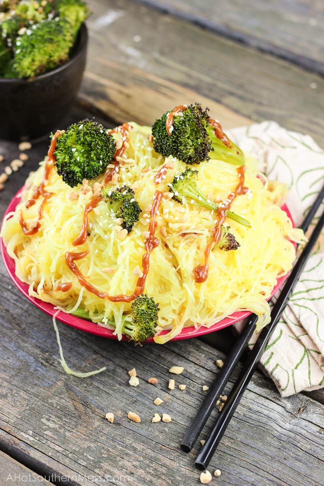 Spicy Peanut Spaghetti Squash A creamy sweet and spicy peanut sauce is drizzled over crispy and tender roasted broccoli and spaghetti squash. Add in your favorite protein, like grilled chicken breasts if you’d like. It’s the perfect easy 30-minute meal combination of Asian meets healthy! www.ahotsouthernmess.com
