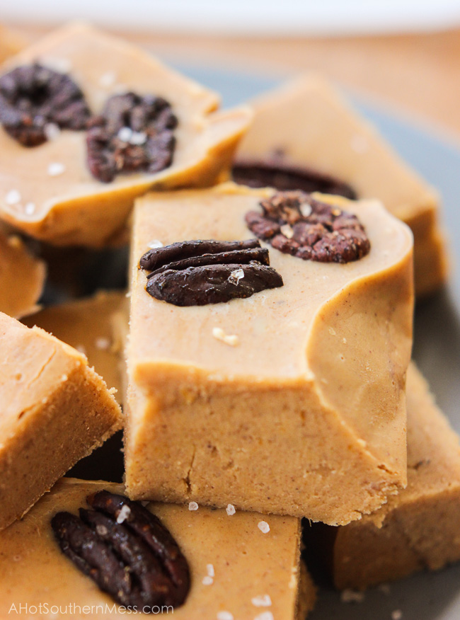 These easy and quick White Chocolate Pumpkin Fudge with Bourbon-Brown Sugar Roasted Pecans are perfect for impressing your friends at your next fall party or get together! www.ahotsouthernmess.com