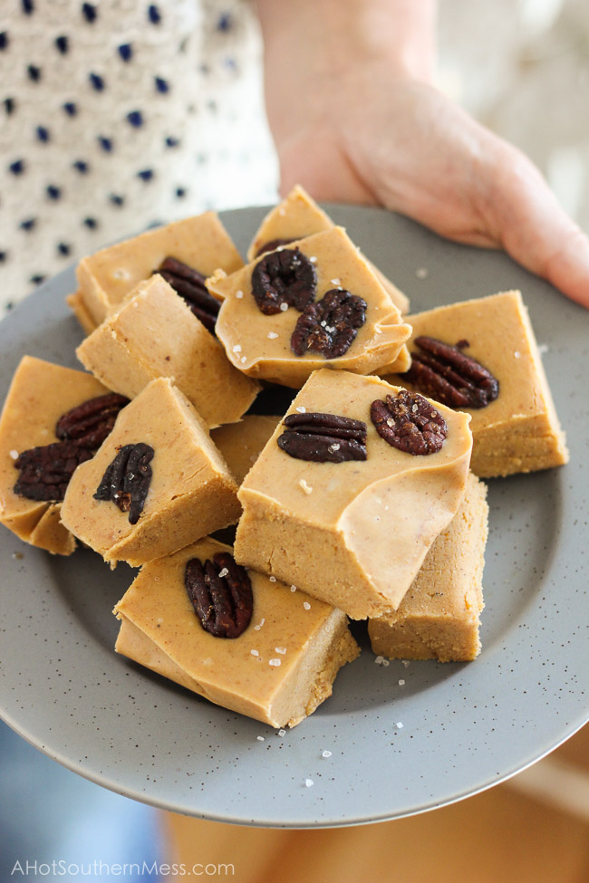 These easy and quick White Chocolate Pumpkin Fudge with Bourbon-Brown Sugar Roasted Pecans are perfect for impressing your friends at your next fall party or get together! www.ahotsouthernmess.com