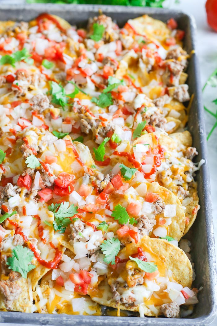 Thanksgiving Leftovers Turkey Nachos via Bless Her Heart, Y'all.