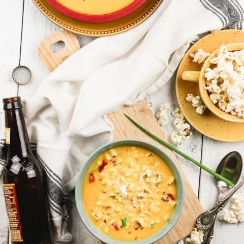 An easy gluten-free slow cooker recipe for beer cheese soup! Toss your ingredients in the crock pot and let it cook! www.blessherheartyall.com