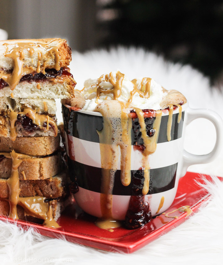This peanut butter and jelly hot chocolate is a decadent and rich twist on the classic hot chocolate. Melting smooth chocolate with creamy peanut butter and sweetened with your favorite berry flavor, (and of course topped with whipped cream and other goodies!) make this an instant cold-weathered favorite. www.blessherheartyall.com