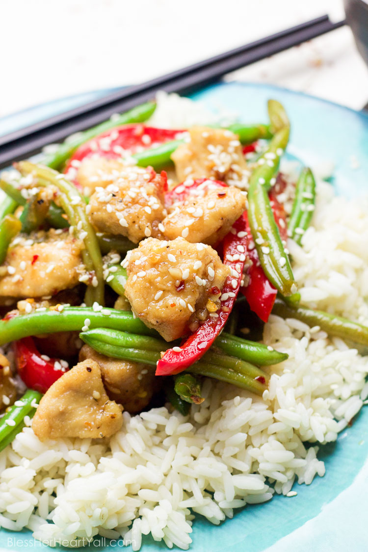 This 30 minute coconut sesame chicken and green beans skillet is a tasty and fresh dish that combines coconut oil, fresh honey, chili flakes, and garlic and then drizzled over fresh chicken and green beans and baked to tender perfection!