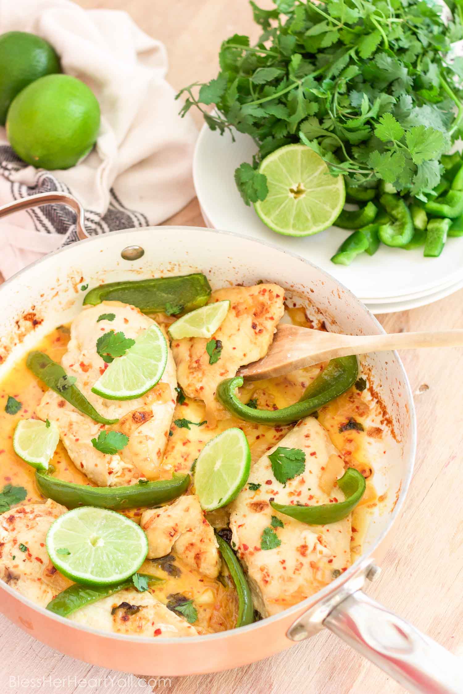 This gluten-free creamy cilantro lime chicken recipe combines the fresh flavors of cilantro, lime, and coconut, with the juiciness of baked chicken and veggies, perfect for warm weather! Your taste buds will think they were on a tropical island!