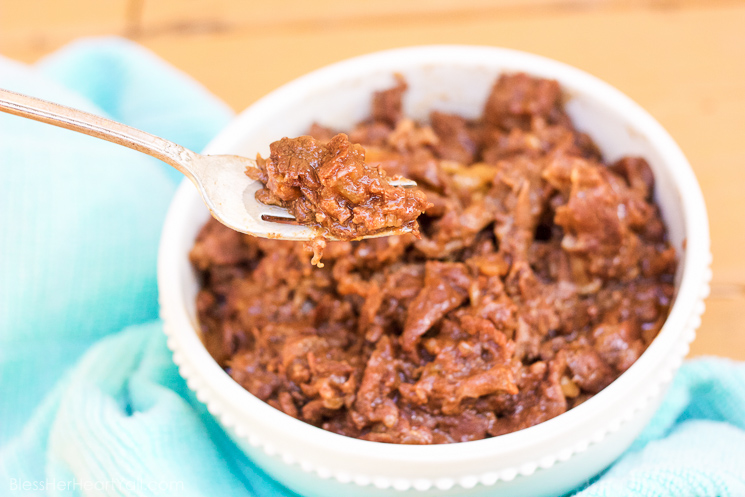 This gluten-free bourbon bbq shredded beef recipe is a magical combination of juicy beef in a garlic and onion barbecue sauce, placed in your slow cooker along with a dash of bourbon, and ready for your enjoyment after a busy day!