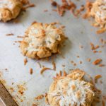 These quick gluten-free smashed coconut peanut butter cookies combine coconut flour, peanut butter, and fresh coconut flakes together for fluffy and sweet cookies in just minutes!