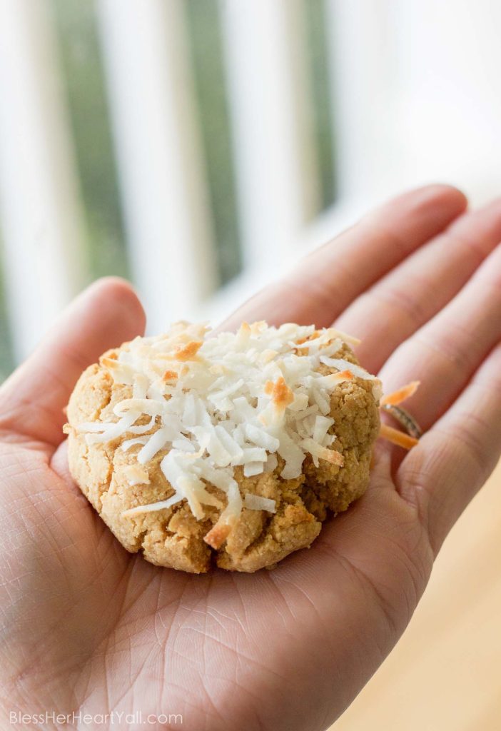 These quick gluten-free smashed coconut peanut butter cookies combine coconut flour, peanut butter, and fresh coconut flakes together for fluffy and sweet cookies in just minutes!