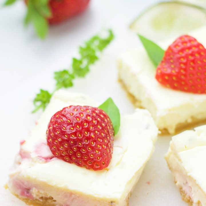 closeup of gluten-free strawberry basil margarita cheesecake squares