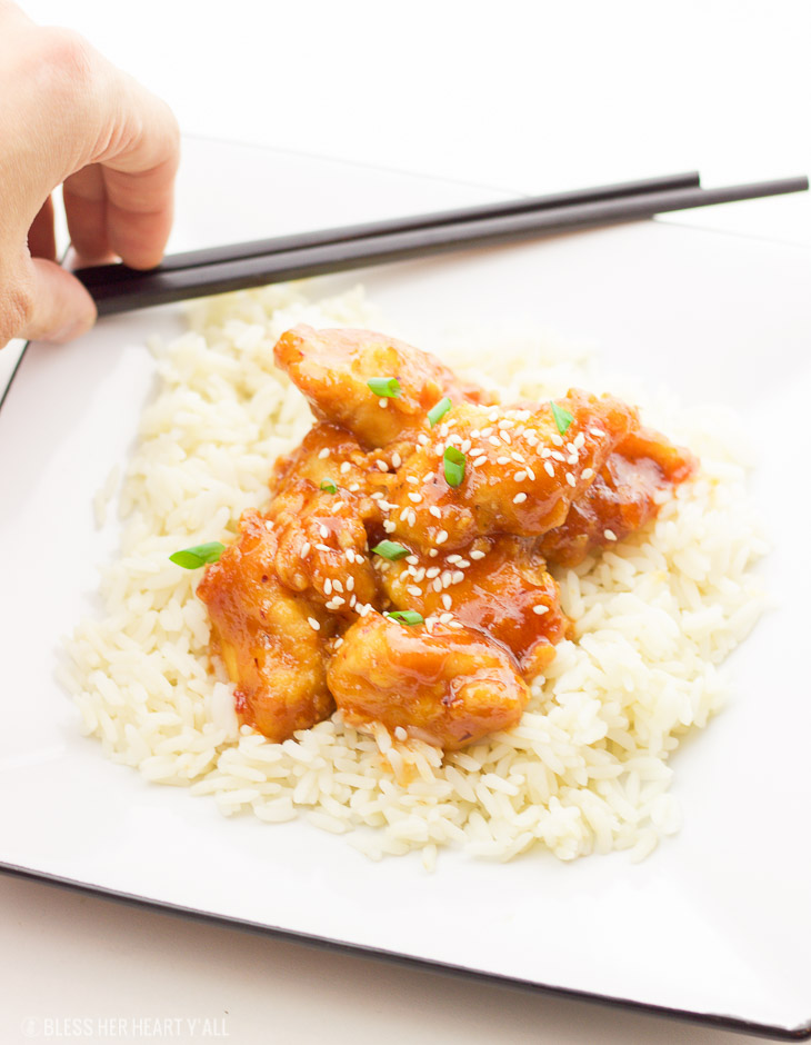 This one-pan baked gluten-free sweet and sour chicken recipe is 100% gluten-free and not fried in a frying pan for even a second. Tender pieces of chicken are lightly breaded in a homemade spiced coating and then drizzled in coconut oil and a sweet and tangy sticky sauce and then baked to perfection.