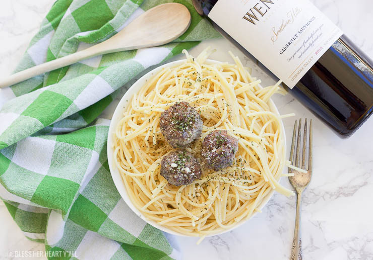 These simple oven baked paleo meatballs are the bomb! Okay but seriously, just combine some grass-fed beef with garlic, onion, egg, liquid aminos, and a little bit of salt and pepper. Roll them up and toss them in the oven for a few minutes and your family will have a whole mess of juicy paleo, gluten-free, and grain-free meatballs!