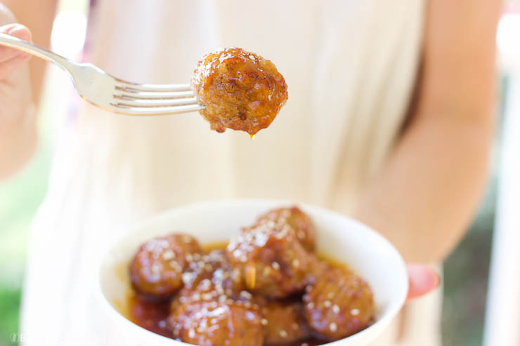 This 3-hour slow cooker honey peach chipotle meatballs are an easy sweet and spicy appetizer that's both gluten-free and paleo-friendly. Grab some honey, peaches, and spices and dig in!