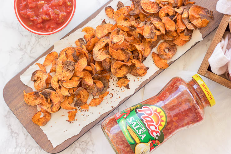 Easy spicy garlic sweet potato chips are a crunchy dippable snack that's both a touch sweet, a bit spicy, and completely addicting.