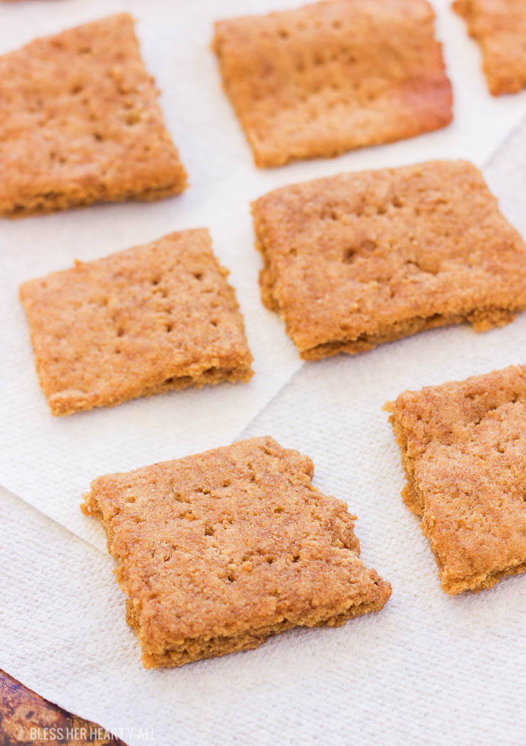 Paleo Gluten-Free Graham Crackers || These paleo gluten-free graham crackers are an easy 15 minute recipe that uses simple ingredients to make moist on the inside and toasted on the outside squares just in time for s'more season! www.BlessHerHeartYall.com
