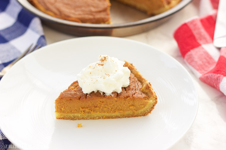 This paleo sweet potato pie is made with simple healthy ingredients and is both decadent and smooth. This southern treat is also gluten free, grain free, and dairy free! Bring on the holidays with this easy recipe y'all! www.blessherheartyall.com