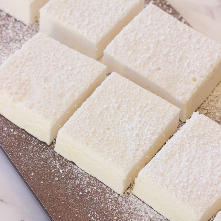 These gluten-free vanilla marshmallows are easy and simple to make and are sweet and fluffy. This classic homemade treat is great inside of a s'more or fantastic all on it's own!