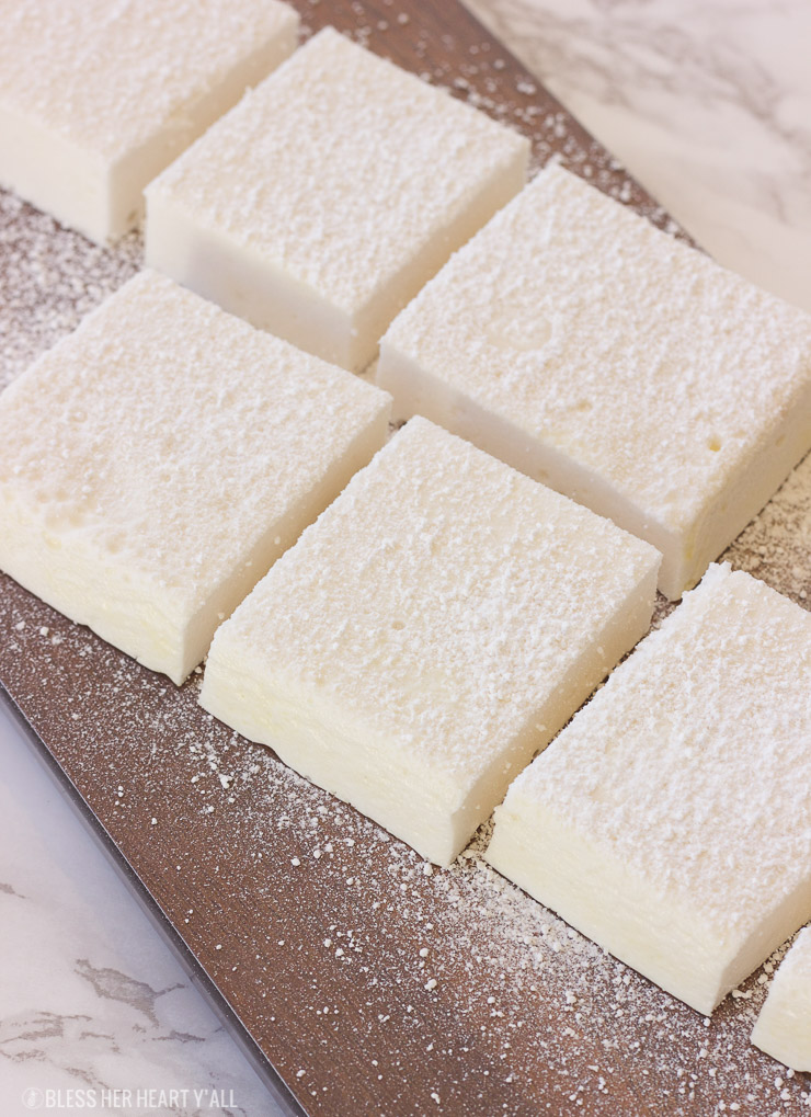 These gluten-free vanilla marshmallows are easy and simple to make and are sweet and fluffy. This classic homemade treat is great inside of a s'more or fantastic all on it's own!