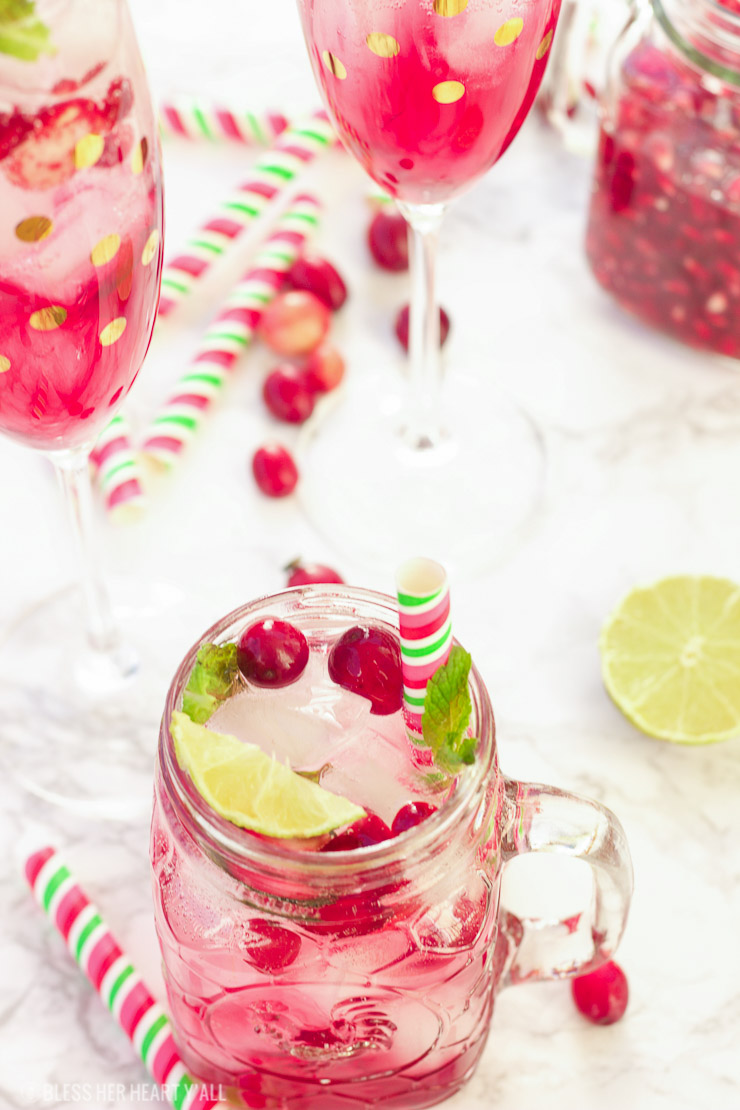 This pomegranate cranberry mojito recipe tastes just as it looks - juicy, sweet, refreshing, and light! With only a few simple ingredients, these cocktails are perfect for your winter holiday parties and for ringing in the new year!