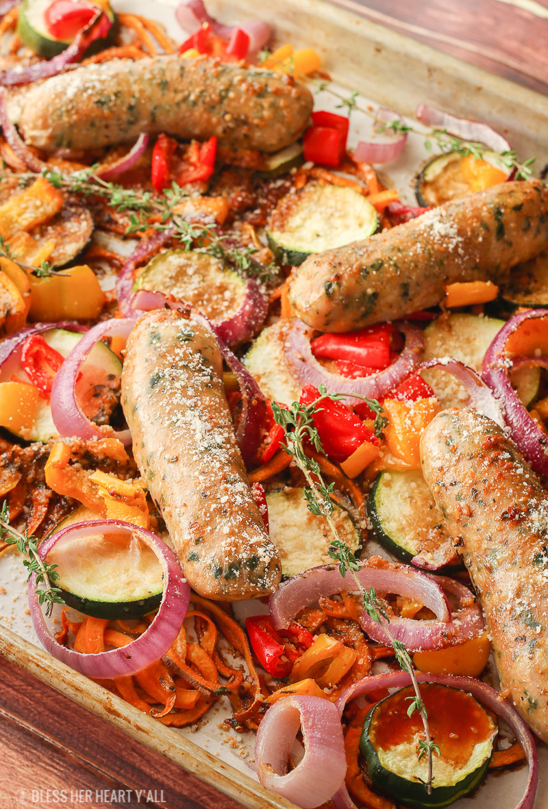 This sheet pan balsamic parmesan chicken sausage dinner is as easy to prepare as it is warm and savory. Healthy vegetables and gluten free chicken sausages are drizzled in a sweet and savory balsamic parmesan sauce then roasted to juicy perfection. The fanciest sausages you'll ever eat are easier than you think to make!