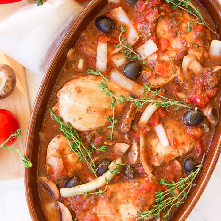 This gluten free slow cooker chicken cacciatore is a healthy dish that is prepped in under 10 minutes and slowly simmers all day in it's fragrant italian-inspired juices, filling your home with it's sweet garlicky and thyme aromas. It also has paleo and dairy-free options. This is the hearty, warm, juicy all-in-one meal that you've been waiting for!