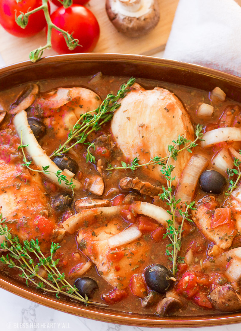 This gluten free slow cooker chicken cacciatore is a healthy dish that is prepped in under 10 minutes and slowly simmers all day in it's fragrant italian-inspired juices, filling your home with it's sweet garlicky and thyme aromas. It also has paleo and dairy-free options. This is the hearty, warm, juicy all-in-one meal that you've been waiting for!