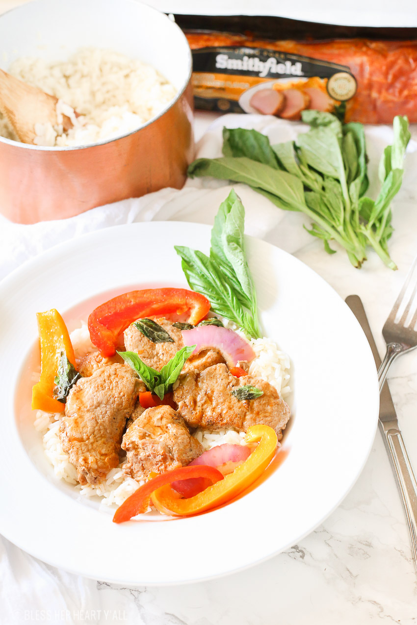 Tender juicy pork loin is cooked in a skillet with fresh vegetables and finished in an easy thai basil sauce all in under 30 minutes! This thai basil pork skillet is the perfect quick and easy weeknight meal that the whole family will love!