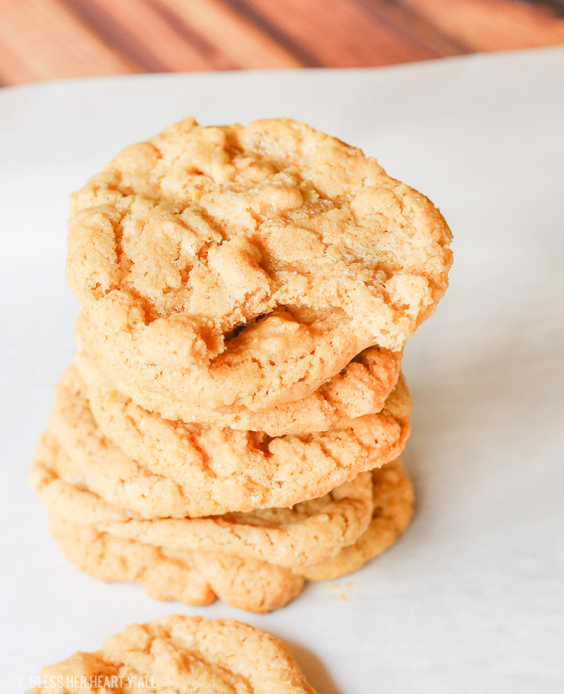 These 4-ingredient gluten free peanut butter cookies take creamy peanut butter, sugar, baking soda, and an egg and in 10 minutes turn it into soft and doughy-centered gluten free peanut butter cookies with perfectly crispy golden brown outer edges. Perfect for dunking in a cold glass of milk!