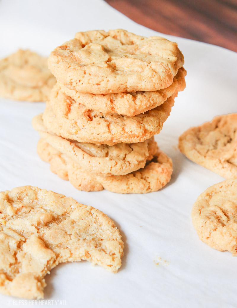 These 4-ingredient gluten free peanut butter cookies take creamy peanut butter, sugar, baking soda, and an egg and in 10 minutes turn it into soft and doughy-centered gluten free peanut butter cookies with perfectly crispy golden brown outer edges. Perfect for dunking in a cold glass of milk!