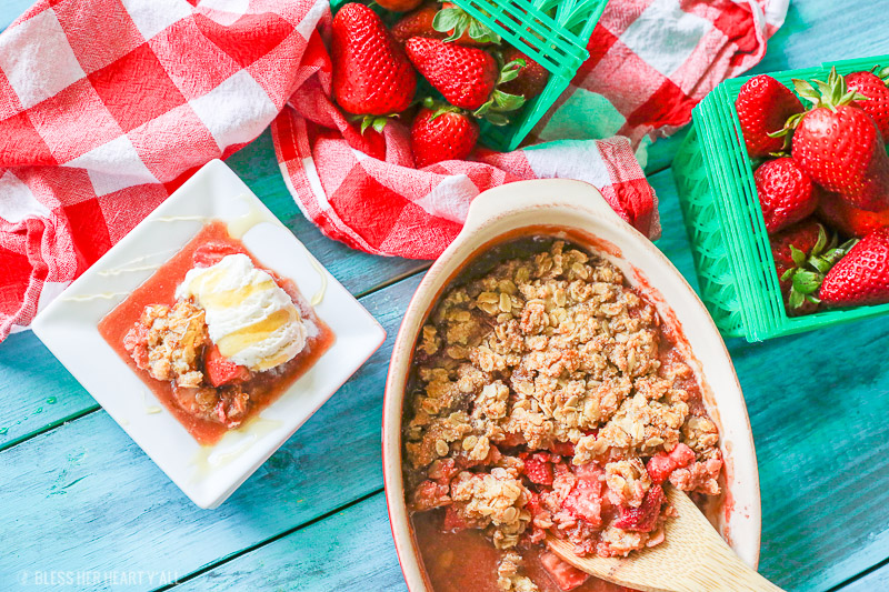 This gluten-free strawberry crumble warms sweet juicy strawberry pieces with a soft and sweet crisp topping. Perfect with vanilla bean ice cream and a drizzle of fresh honey!