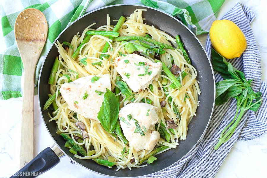 This chicken pasta in garlic basil butter sauce recipe makes for an easy gluten free dinner for busy weeknights. Pasta and chicken is tossed with the vegetables you already have in your kitchen and drizzled in a sizzling light and creamy garlic butter sauce with extra hints of basil and lemon! image 3
