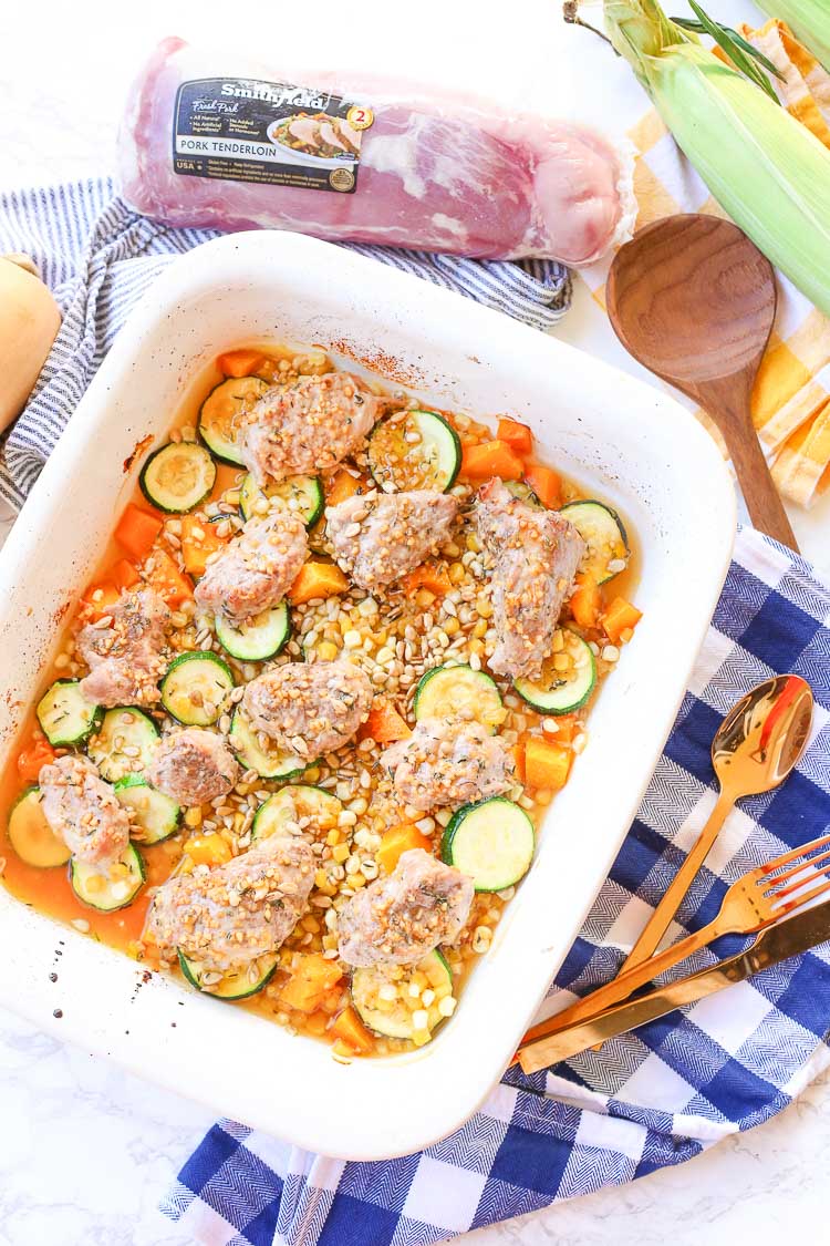 Roasted honey garlic autumn pork and vegetables is a quick and easy weeknight dinner meal prepared in about 30 minutes with real flavor real fast!  Honey garlic sauce is drizzled over seasonal vegetables and juicy pork medallions!