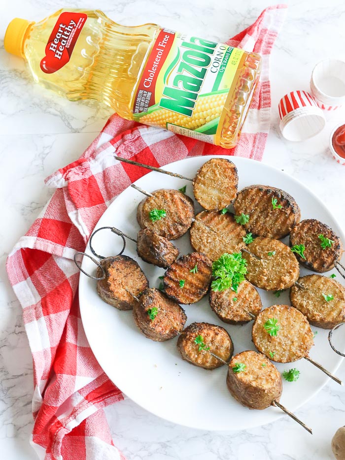 grilled marinated potatoes on skewers