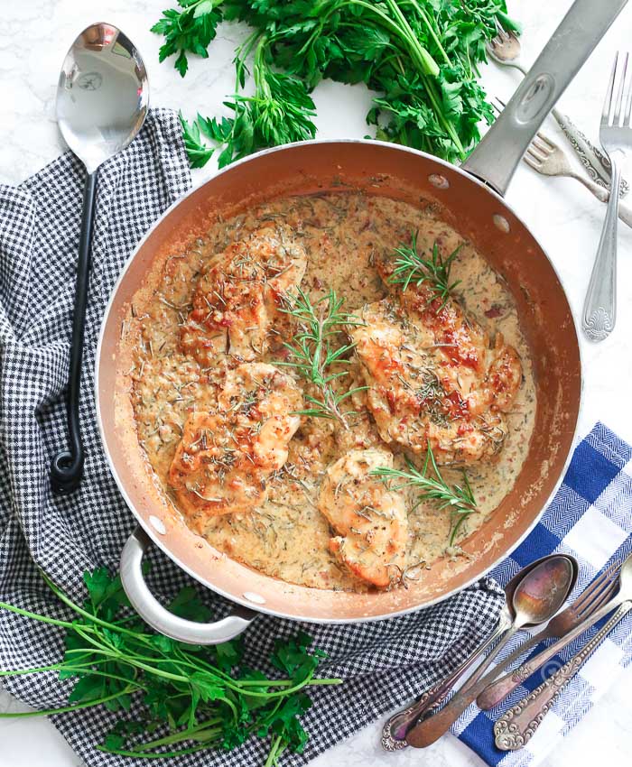 Chicken with White Wine Cream Sauce breast in skillet