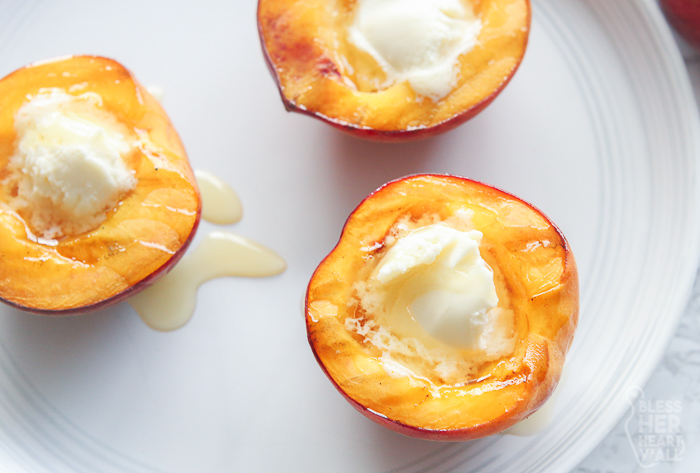 Gluten Free Grilled Peaches and Cream in a white plate