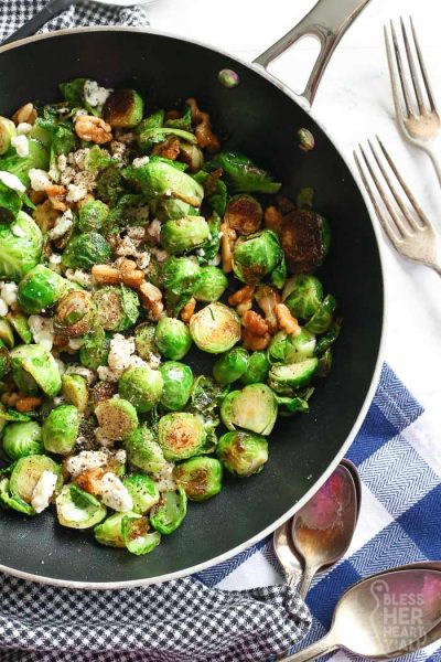 brussel sprouts and blue cheese in skillet pan