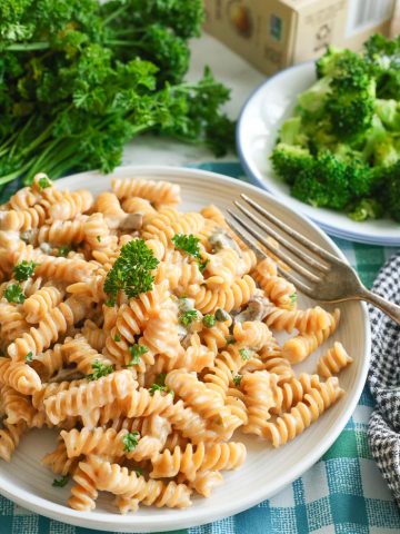 lemon caper rotini pasta in white bowl